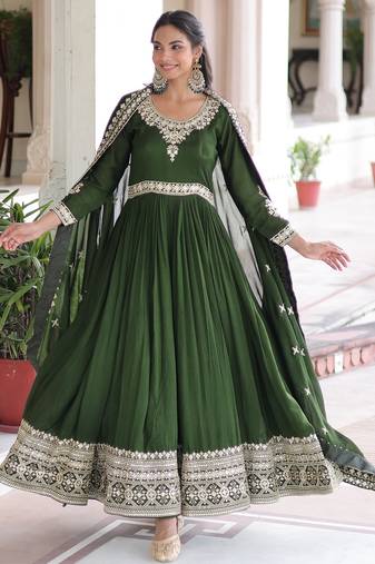 Green heavy embroidered ethnic gown with dupatta