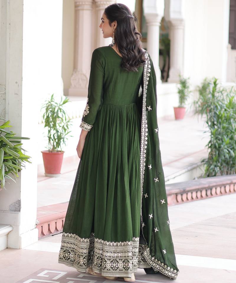 Green heavy embroidered ethnic gown with dupatta