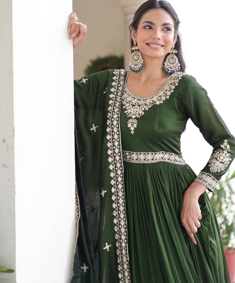 Green heavy embroidered ethnic gown with dupatta