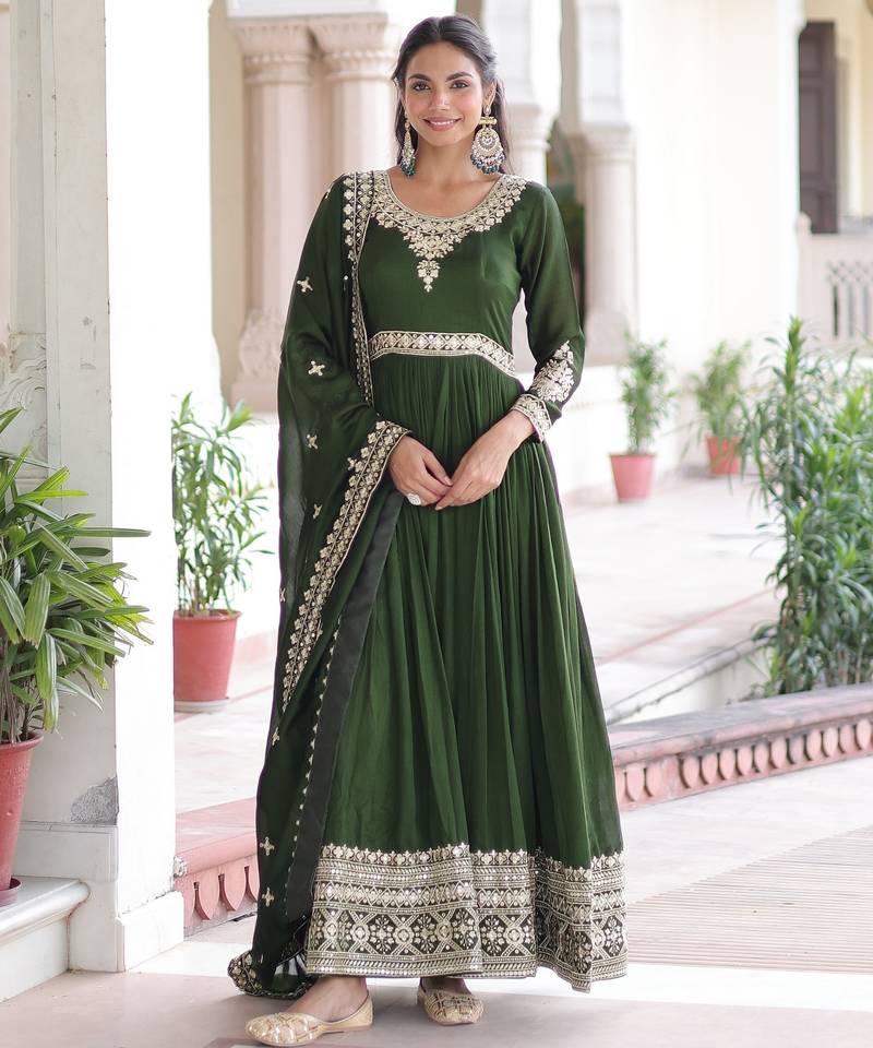 Green heavy embroidered ethnic gown with dupatta