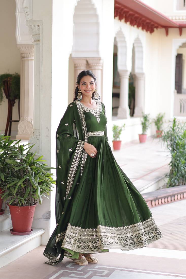 Green heavy embroidered ethnic gown with dupatta