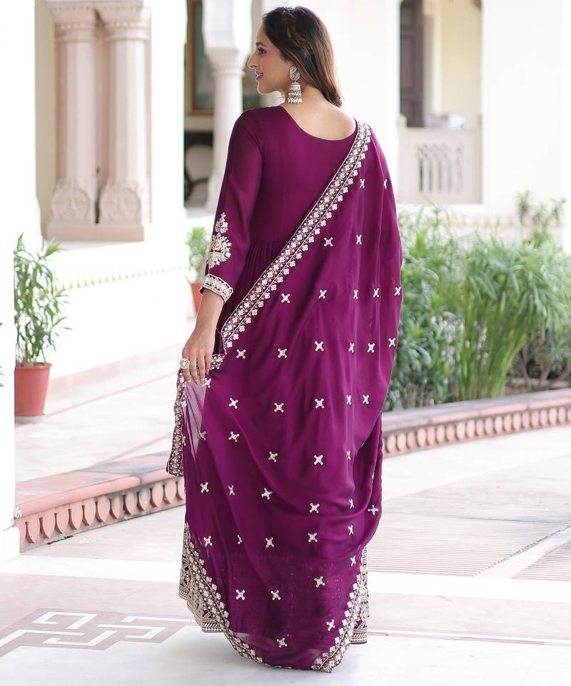 Purple heavy embroidered ethnic gown with dupatta