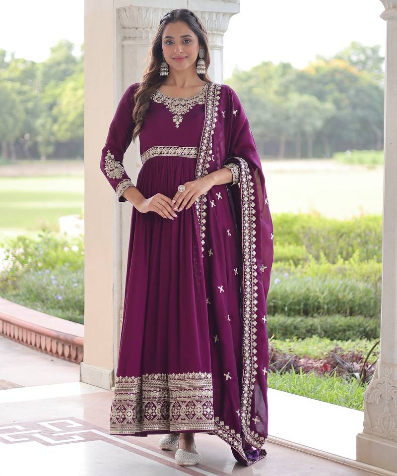 Purple heavy embroidered ethnic gown with dupatta