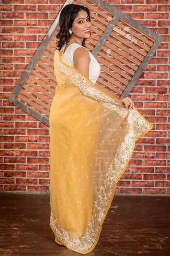 yellow embroidered organza hand embroidery all seasons sarees