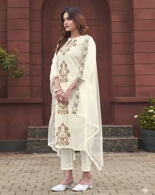 Off white rayon slub embroidered festive wear salwar kameez 3