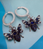 Blushing petals earrings in black plated pink