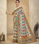 graceful ethnic off white color bollywood style crepe silk blend designer digital foil printed saree