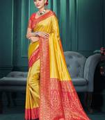 yellow color traditional kanjivaram silk blend blend saree with beautiful woven designer