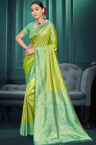 green color traditional kanjivaram silk blend blend saree with beautiful woven designer