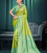 green color traditional kanjivaram silk blend blend saree with beautiful woven designer