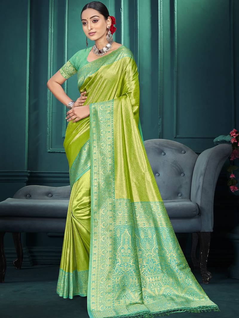 green color traditional kanjivaram silk blend blend saree with beautiful woven designer