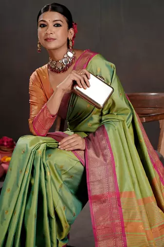 green graceful art silk blend woven jacquard saree