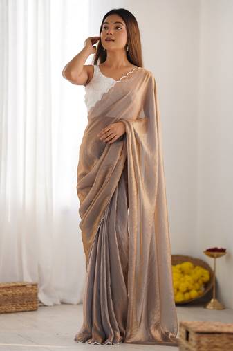 chiku color beautiful bollywood style ceremonial saree with beeds work blouse