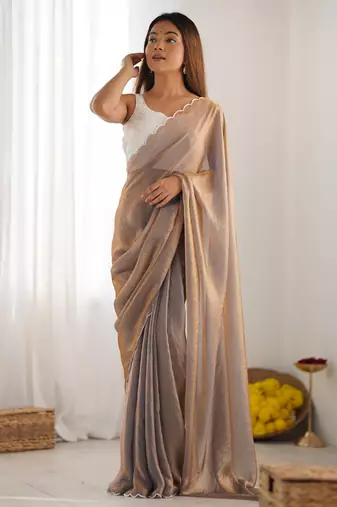 chiku color beautiful bollywood style ceremonial saree with beeds work blouse