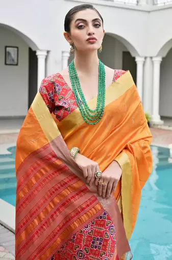 orange khadi raw silk blend blend woven meena rich pallu border saree