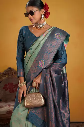 teal art silk blend woven jacquard saree