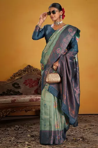 teal art silk blend woven jacquard saree