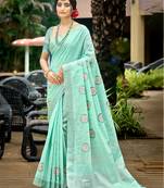 sky blue color linen fabric woven designer saree with floral embroidered work