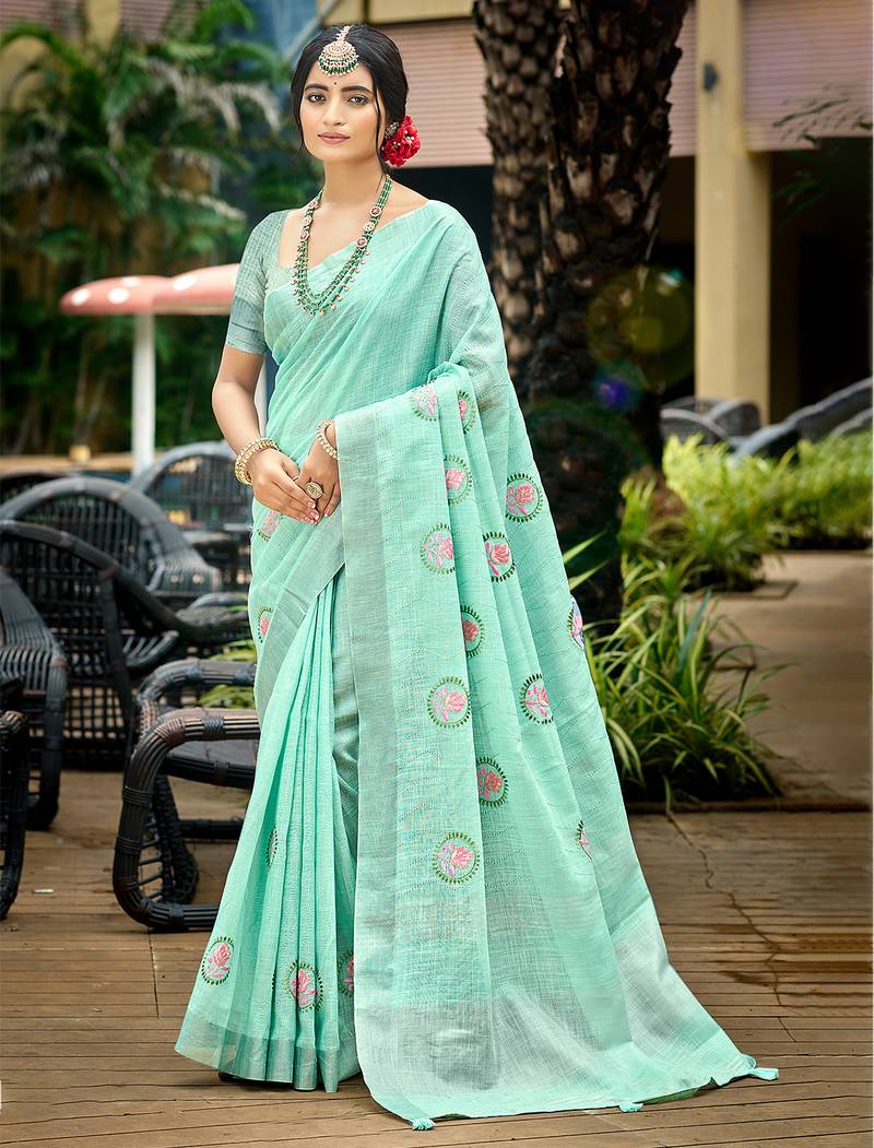 sky blue color linen fabric woven designer saree with floral embroidered work