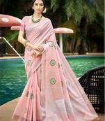 light pink color linen fabric woven designer saree with floral embroidered work