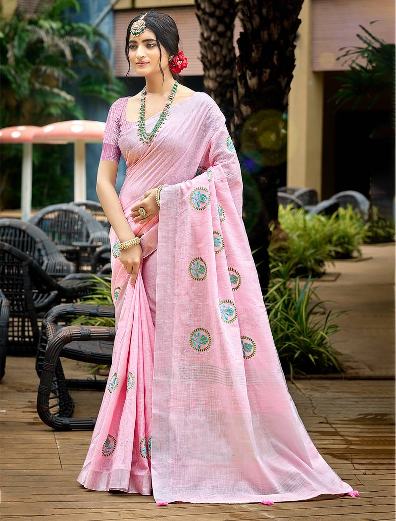 baby pink color linen fabric woven designer saree with floral embroidered work
