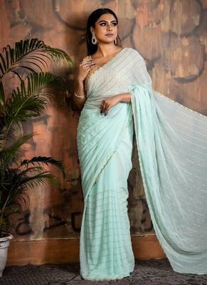 green woven georgette cutdana work all seasons sarees 1