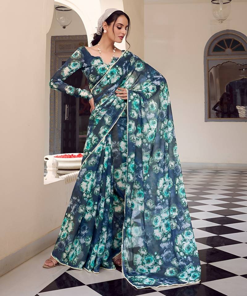 teal color georgette fabric beautiful floral printed saree