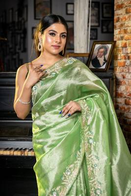 green woven tissue zari work all seasons sarees 2