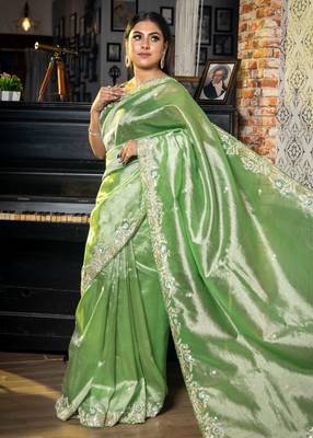 green woven tissue zari work all seasons sarees 3