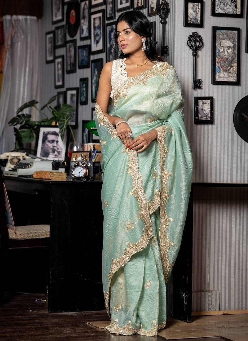 green woven tissue sequins work all seasons sarees