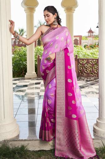 purple color georgette fabric heavy wevon designer work  graceful saree