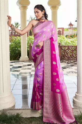 purple color georgette fabric heavy wevon designer work  graceful saree