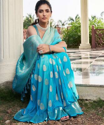 firozi georgette heavy wevon work graceful saree 3
