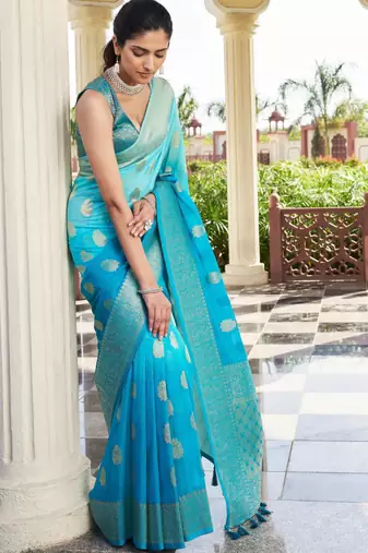 firozi georgette heavy wevon work graceful saree