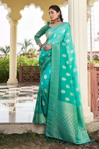 sea green color georgette fabric heavy wevon designer work  graceful saree