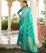 sea green color georgette fabric heavy wevon designer work  graceful saree