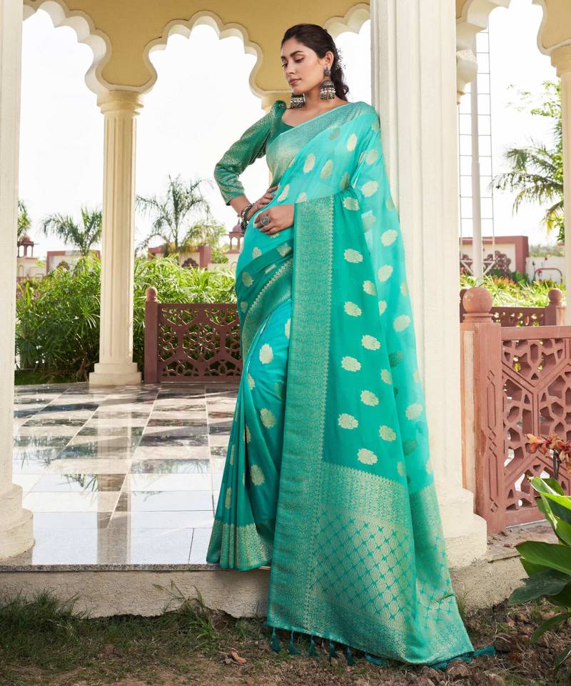 sea green color georgette fabric heavy wevon designer work  graceful saree