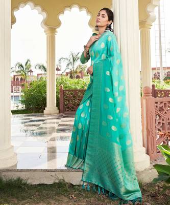 sea green georgette heavy wevon work graceful saree 2