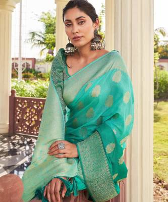 sea green georgette heavy wevon work graceful saree 3