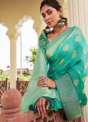 sea green georgette heavy wevon work graceful saree 4