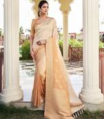 peach color georgette fabric heavy wevon designer work  graceful saree