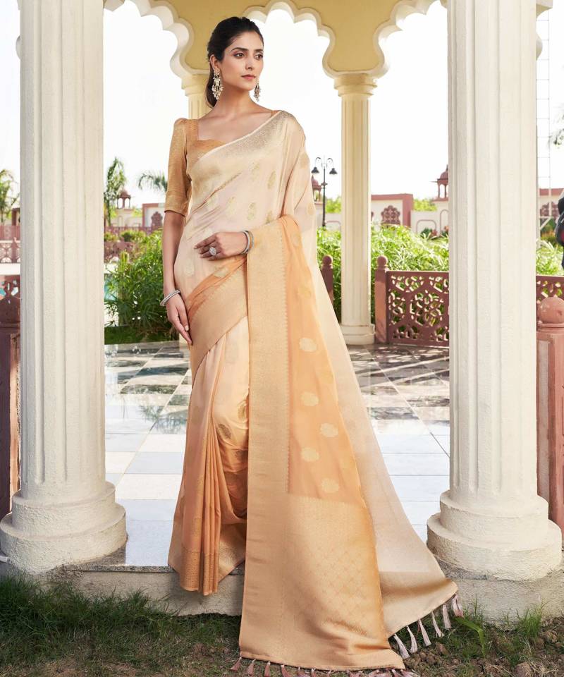 peach color georgette fabric heavy wevon designer work  graceful saree