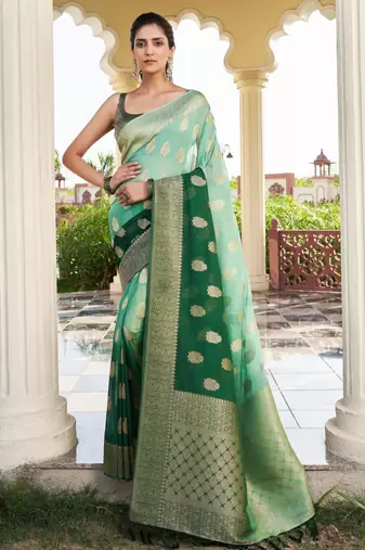 green color georgette fabric heavy wevon designer work  graceful saree