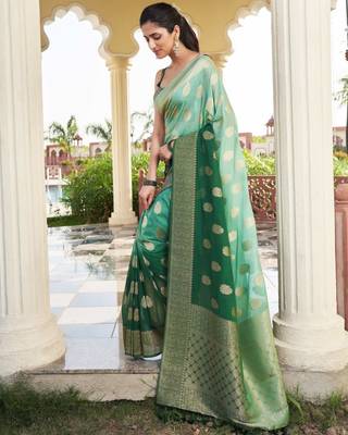 green georgette heavy wevon work graceful saree 2