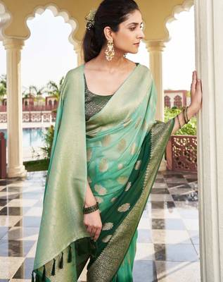 green georgette heavy wevon work graceful saree 3