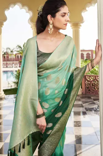 green georgette heavy wevon work graceful saree