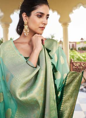 green georgette heavy wevon work graceful saree 4