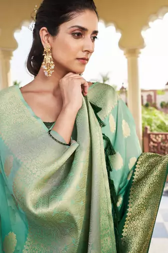 green georgette heavy wevon work graceful saree