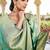 green color georgette fabric heavy wevon designer work  graceful saree