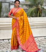 mustard color patola silk blend fabric woven meenakari designer saree